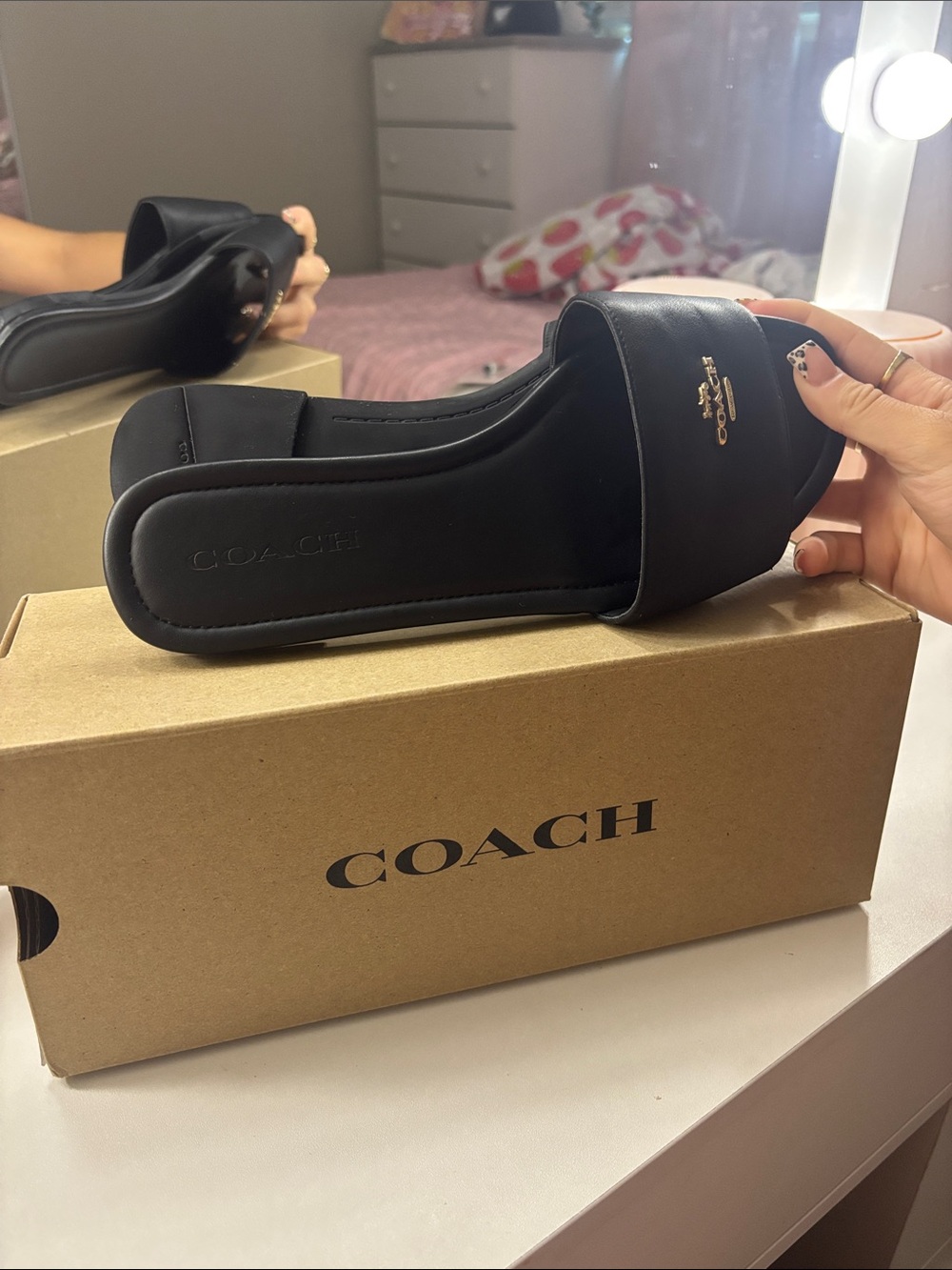 Coach Black Slide Sandals with Gold Logo Accent